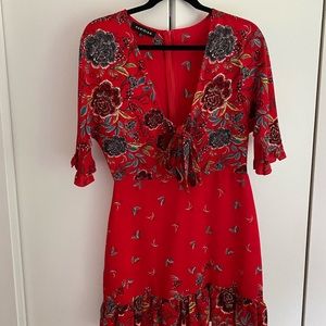 Red sundress with flower accents